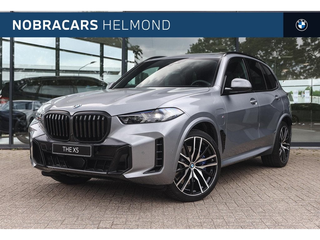 BMW X5 xDrive50e M Sport Automaat / Trekhaak / Panoramadak /, Auto's, Automaat, 2395 kg, Leder, Bedrijf