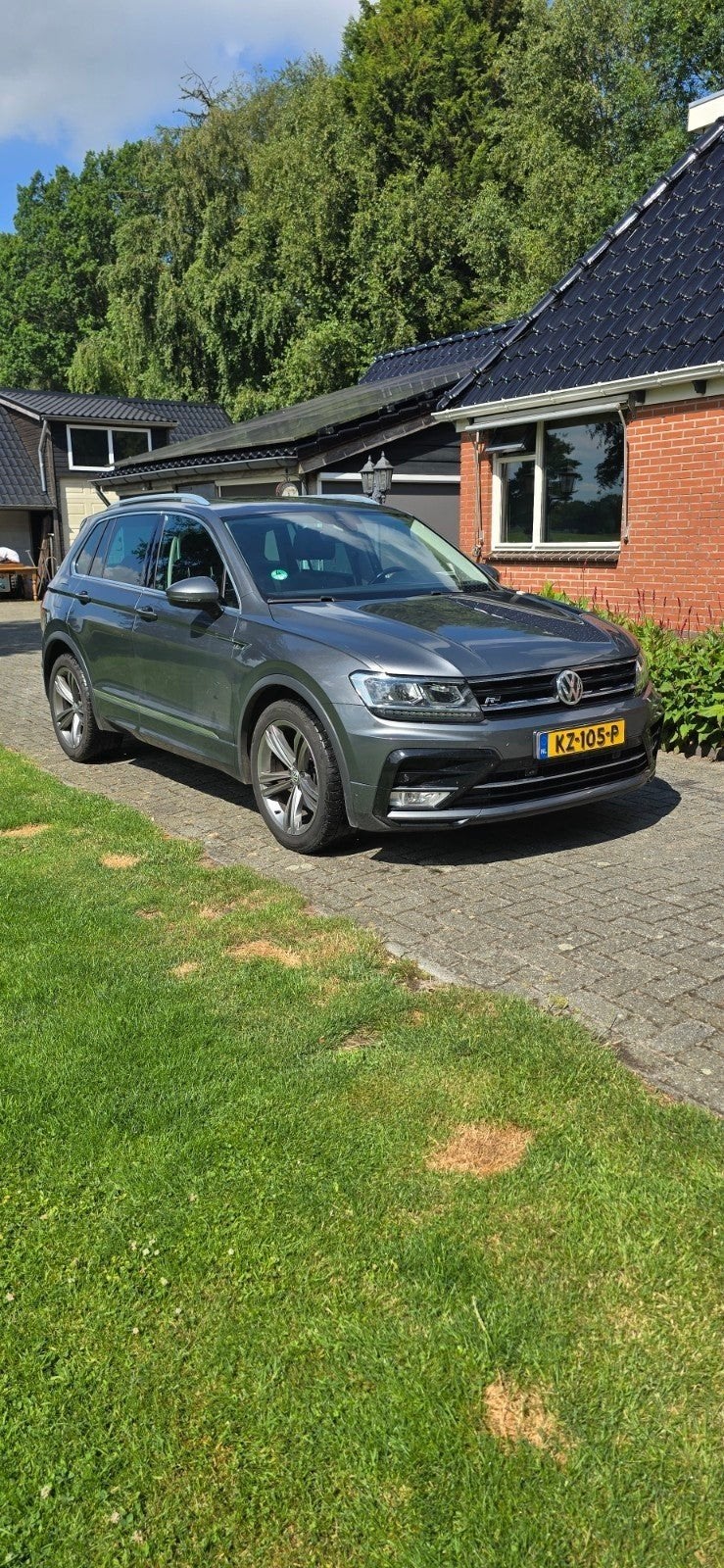 Volkswagen Tiguan 1.4 TSI 92KW 2017 Grijs, Auto's, Voorwielaandrijving, 125 pk, 4 cilinders, Alcantara