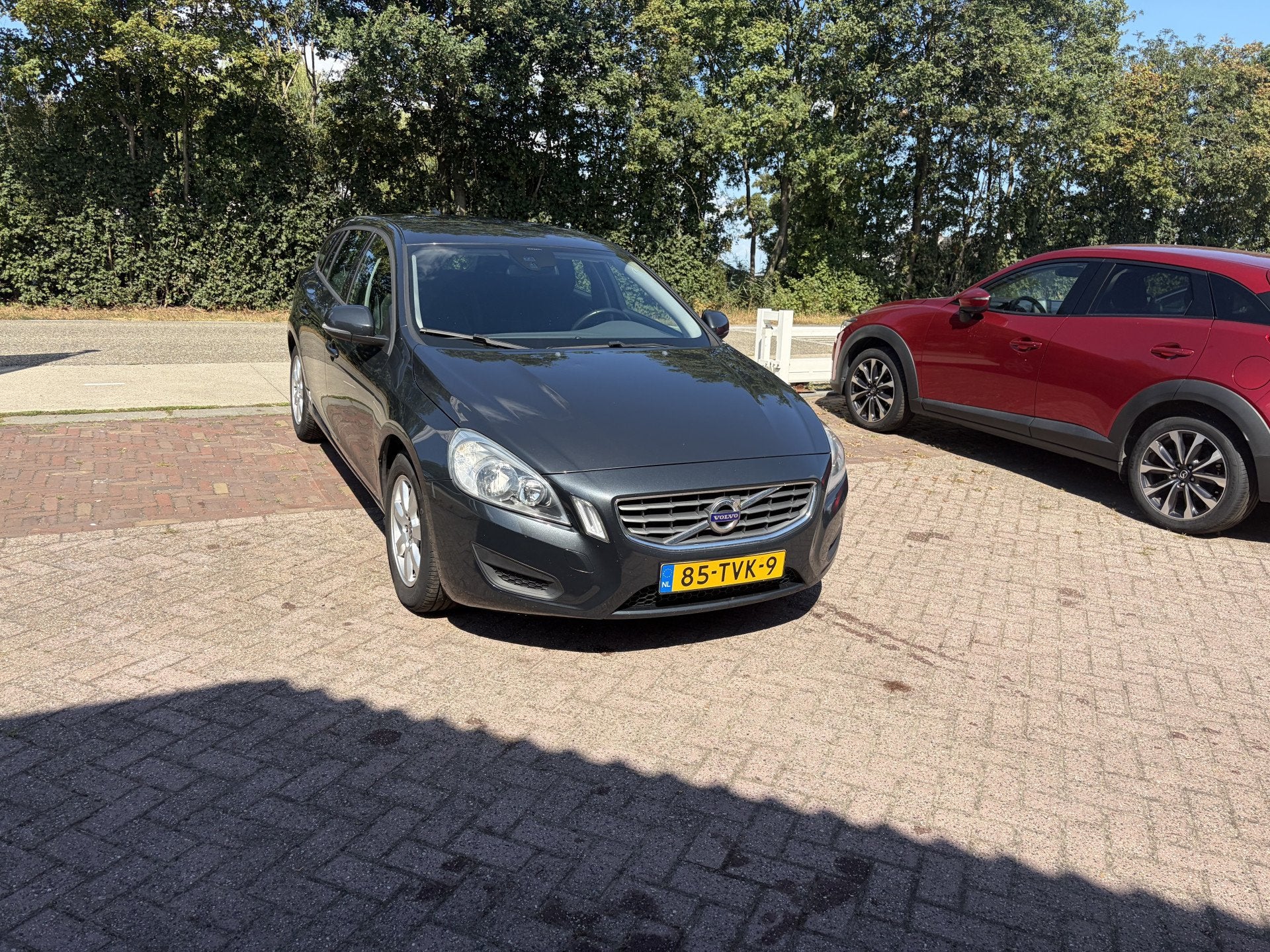 Volvo V60 1.6 T3 TREKHAAK NAVI CLIMA (bj 2012), Auto's, Stof, Gebruikt, Zwart, 4 cilinders