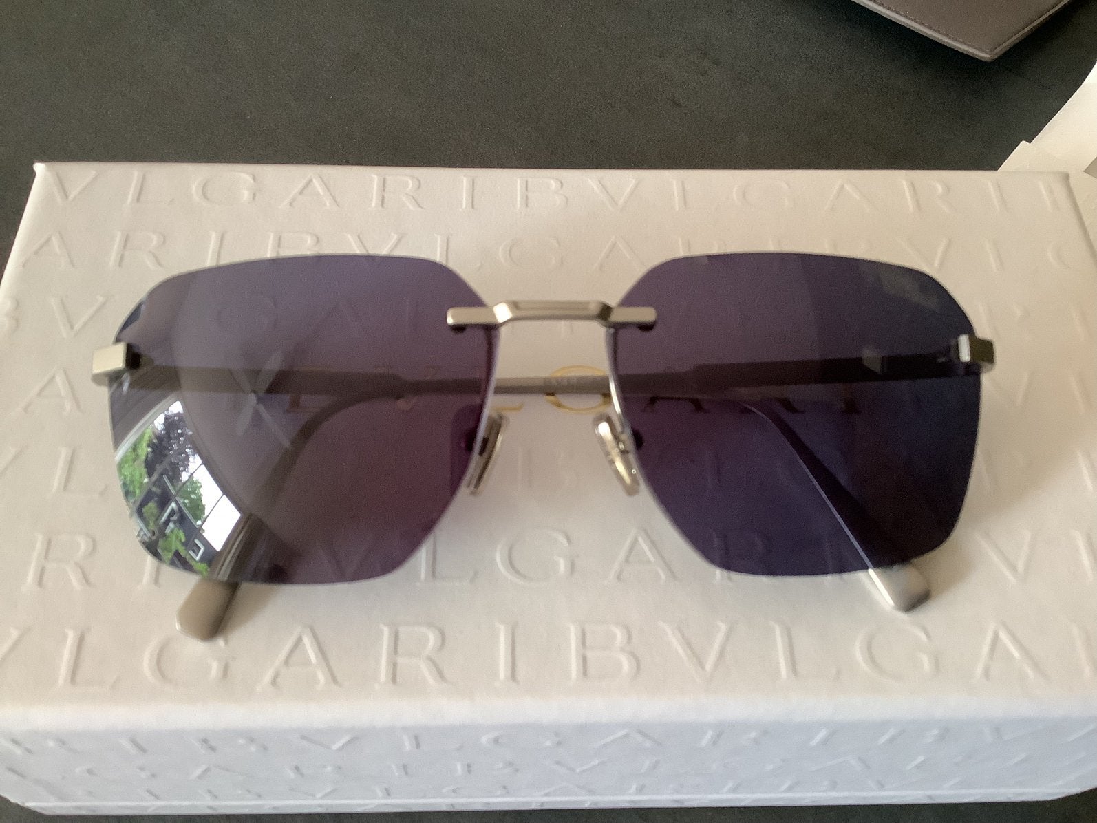 Orginele Bvlgari zonnebril BV40029U titanium montuur, Ophalen, Zo goed als nieuw, Bruin, Overige merken