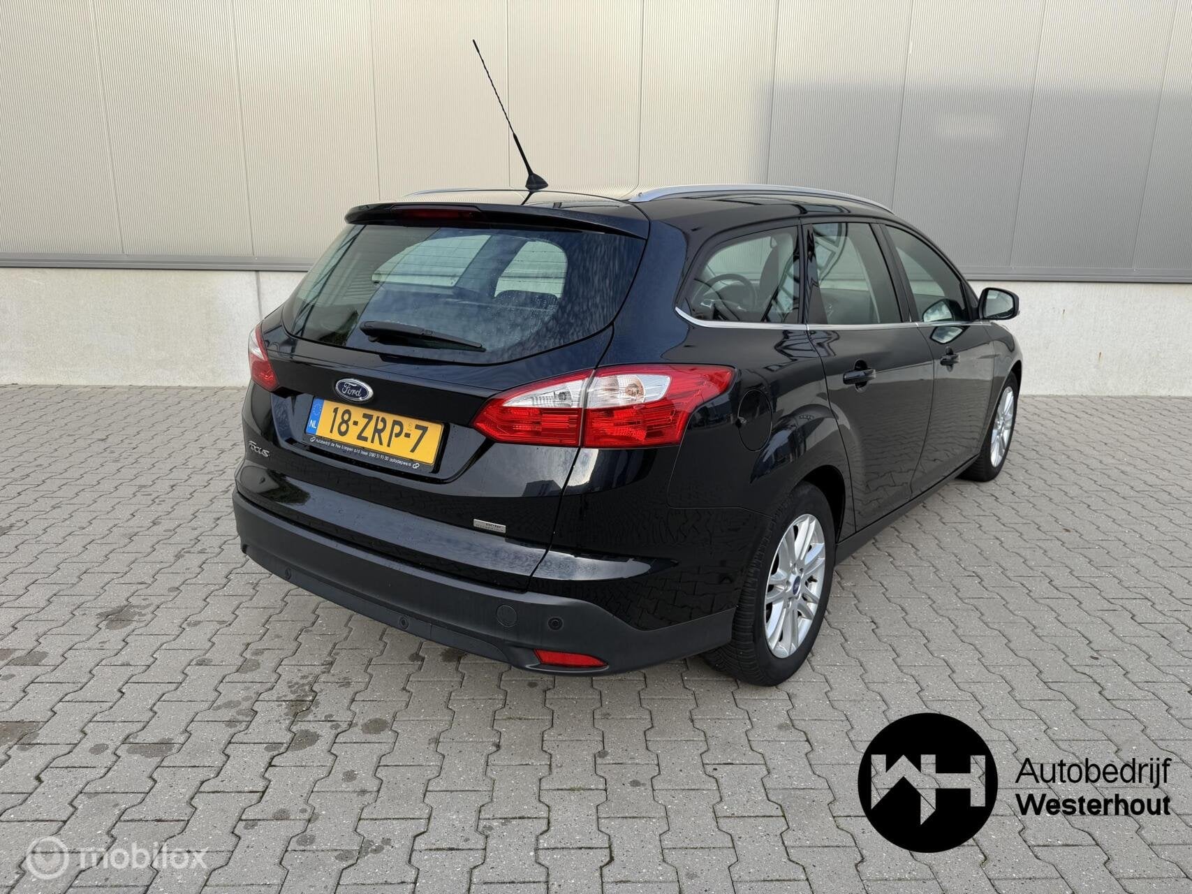 Ford Focus Wagon 1.0 EcoBoost Titanium|PARKEERSENSOREN|NAVI, Auto's, Euro 5, 125 pk, Gebruikt, Zwart