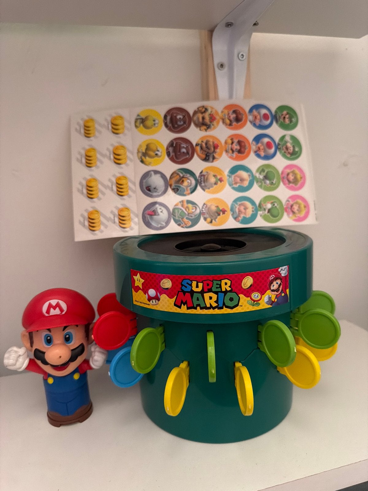 Super Mario spel met Mario figuur en stickers, Ophalen, Zo goed als nieuw