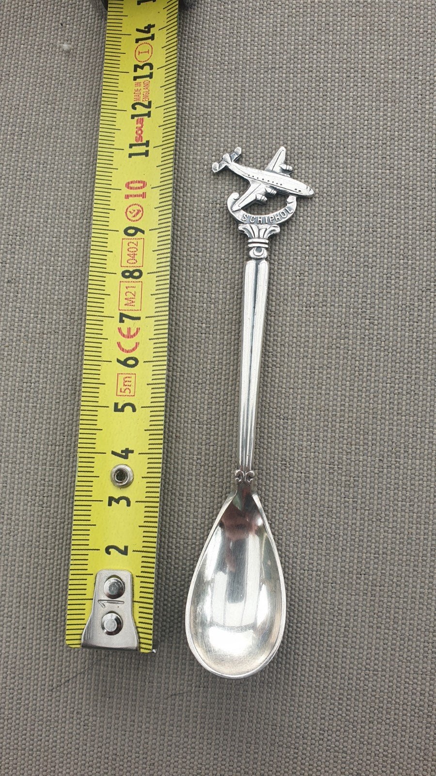 Vintage Schiphol souvenir lepel met vliegtuig, Ophalen of Verzenden