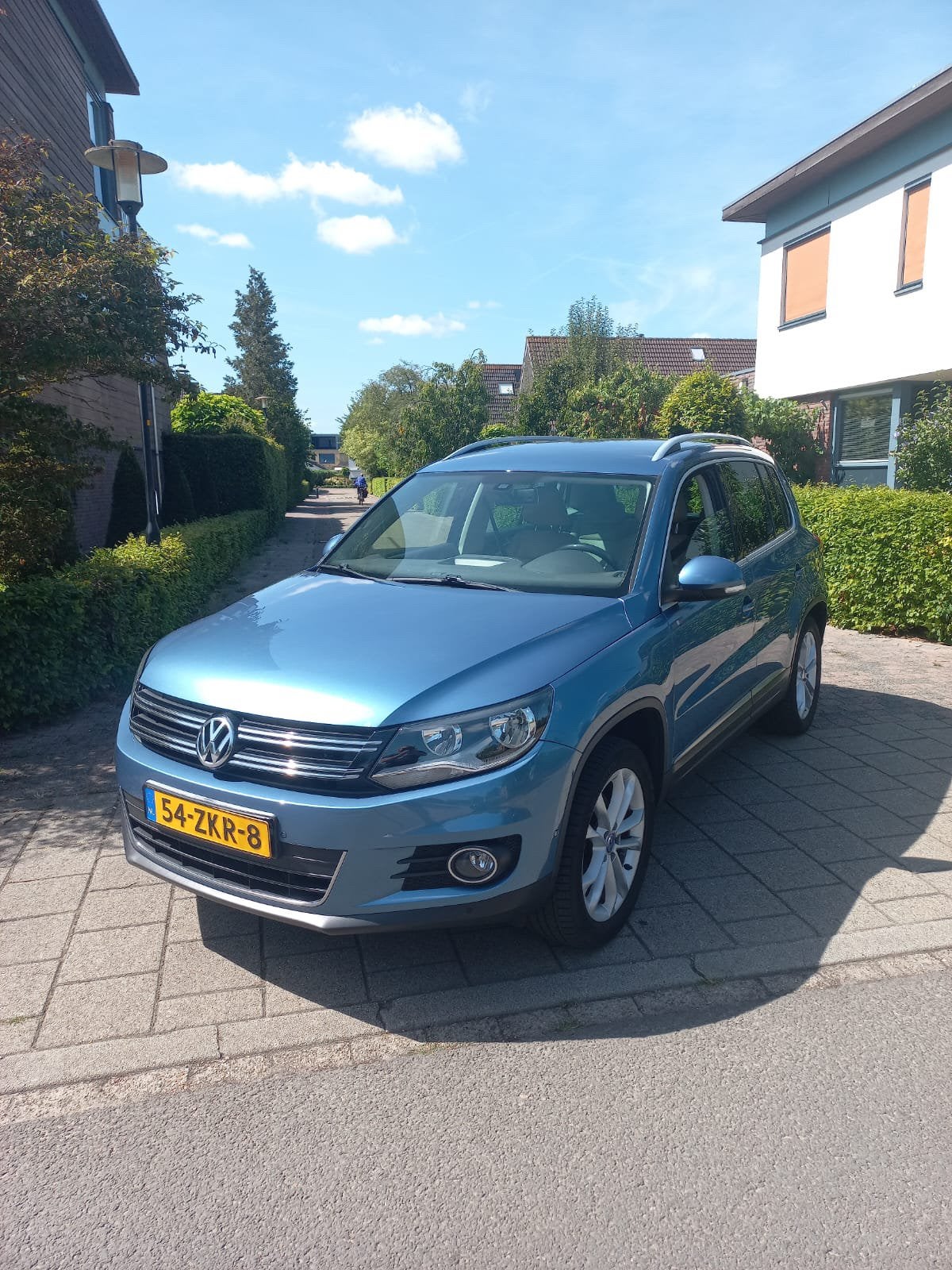 Volkswagen Tiguan 1.4 TSI 90KW BMT december  2012 Blauw, Auto's, Volkswagen, Voorwielaandrijving, 15 km/l, Beige, Blauw