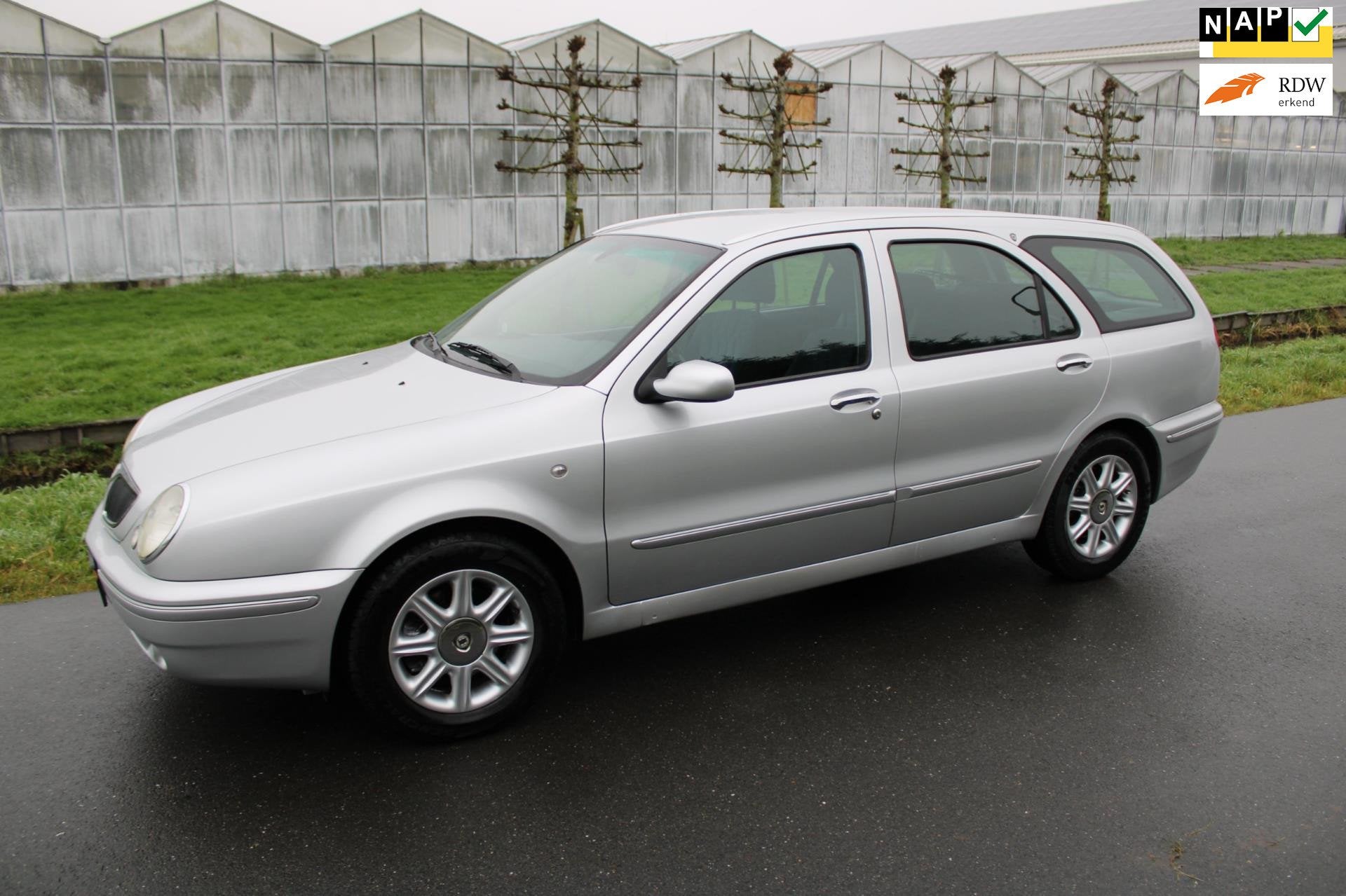 Lancia Lybra SW 1.8-16V LX 1 Eigenaar, Auto's, Gebruikt, 4 cilinders, 400 kg, Alcantara