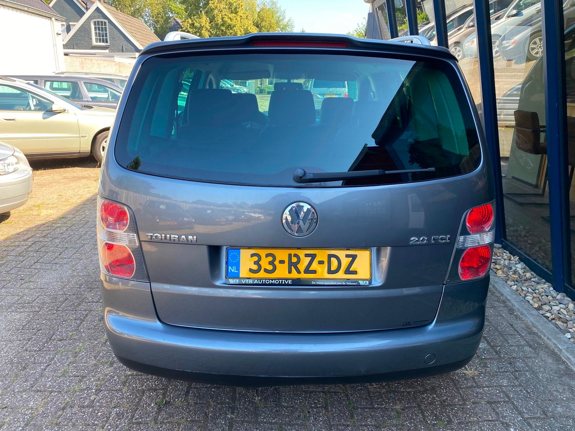 Volkswagen Touran 2.0-16V FSI Highline Automaat 63.758KM!, Gebruikt, Zwart, Alcantara, Bedrijf