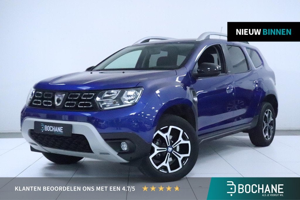 Dacia Duster 1.0 TCe Bi-Fuel Comfort | Airco | Camera | Trek, Auto's, Voorwielaandrijving, Gebruikt, 4 cilinders, Blauw