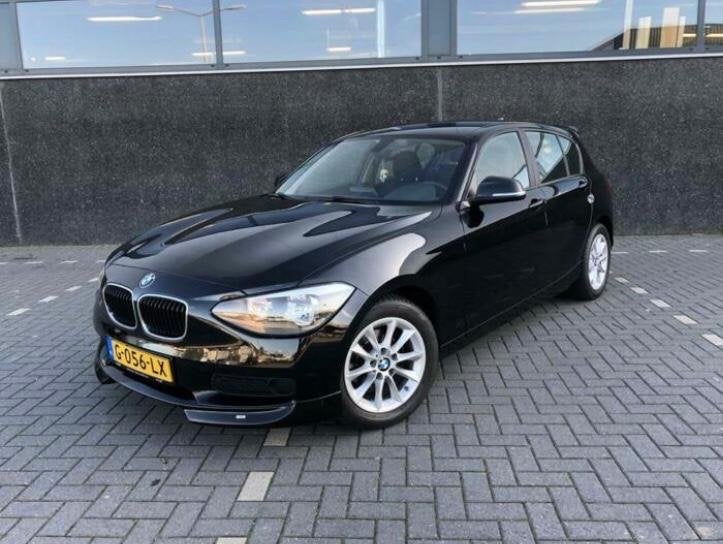 BMW 1-Serie 116I 100KW 5DR 2013 Zwart, Auto's, 1-Serie, Zwart, 4 cilinders, Zwart