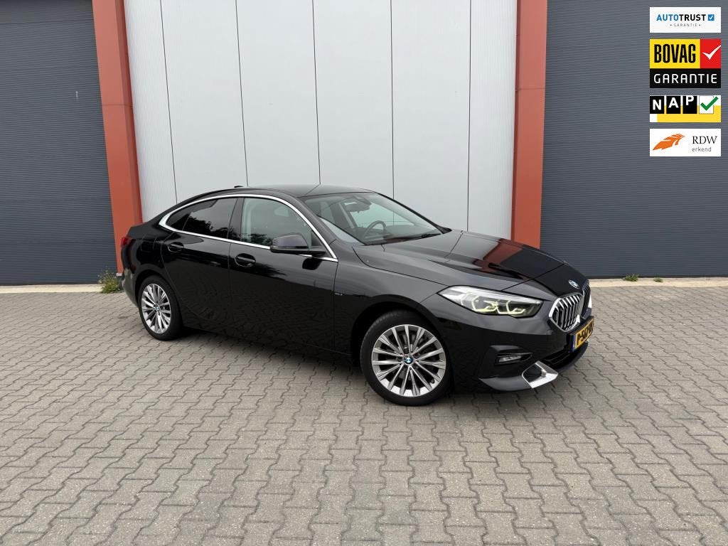 BMW 2-serie Gran Coupé 218i Business Edition Plus, Auto's, 136 pk, Gebruikt, 1350 kg, Zwart