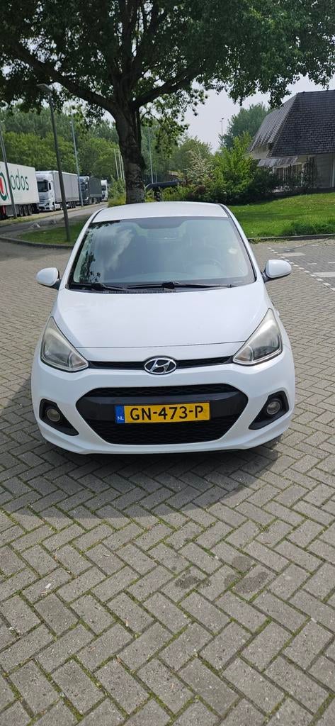 Hyundai i10 1.0  i-Motion Confort 5DR 2015 Wit, Auto's, Hyundai, Euro 5, 31 €/maand, 4 stoelen, Origineel Nederlands