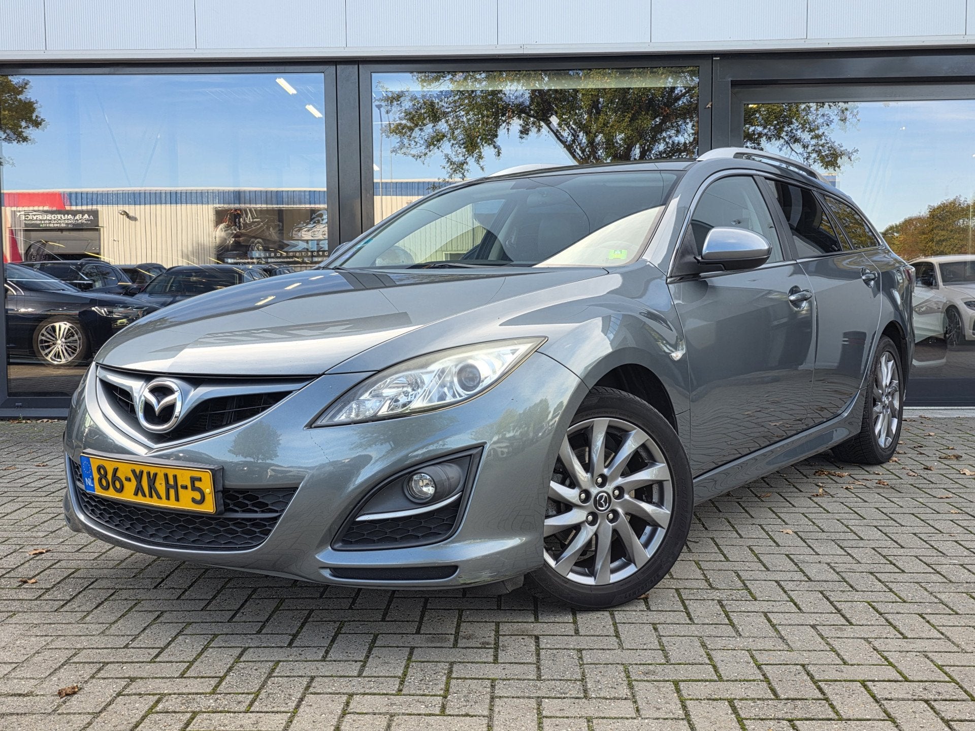 Mazda 6 Sportbreak 1.8 Exclusive GT (bj 2012), Auto's, Voorwielaandrijving, Euro 5, Gebruikt, Zwart