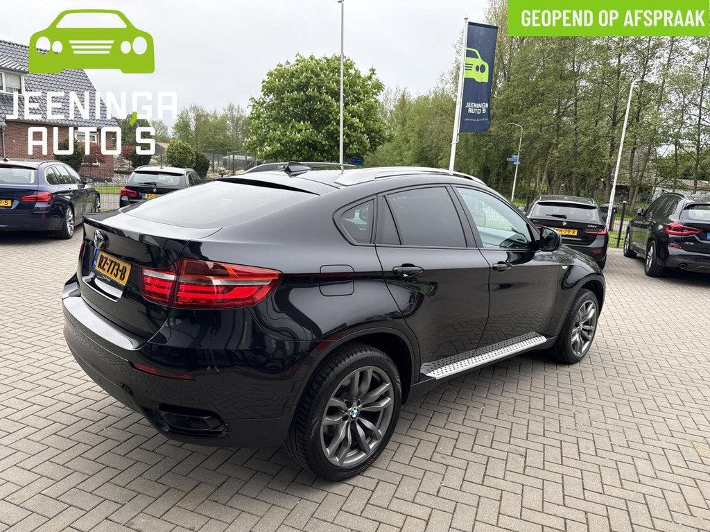 BMW X6 M50d|Leer|Camera|Memory|Achterbankverwarming|DVD|M-pa, Auto's, BMW, Euro 5, Bi-Xenon koplampen, Gebruikt, Zwart