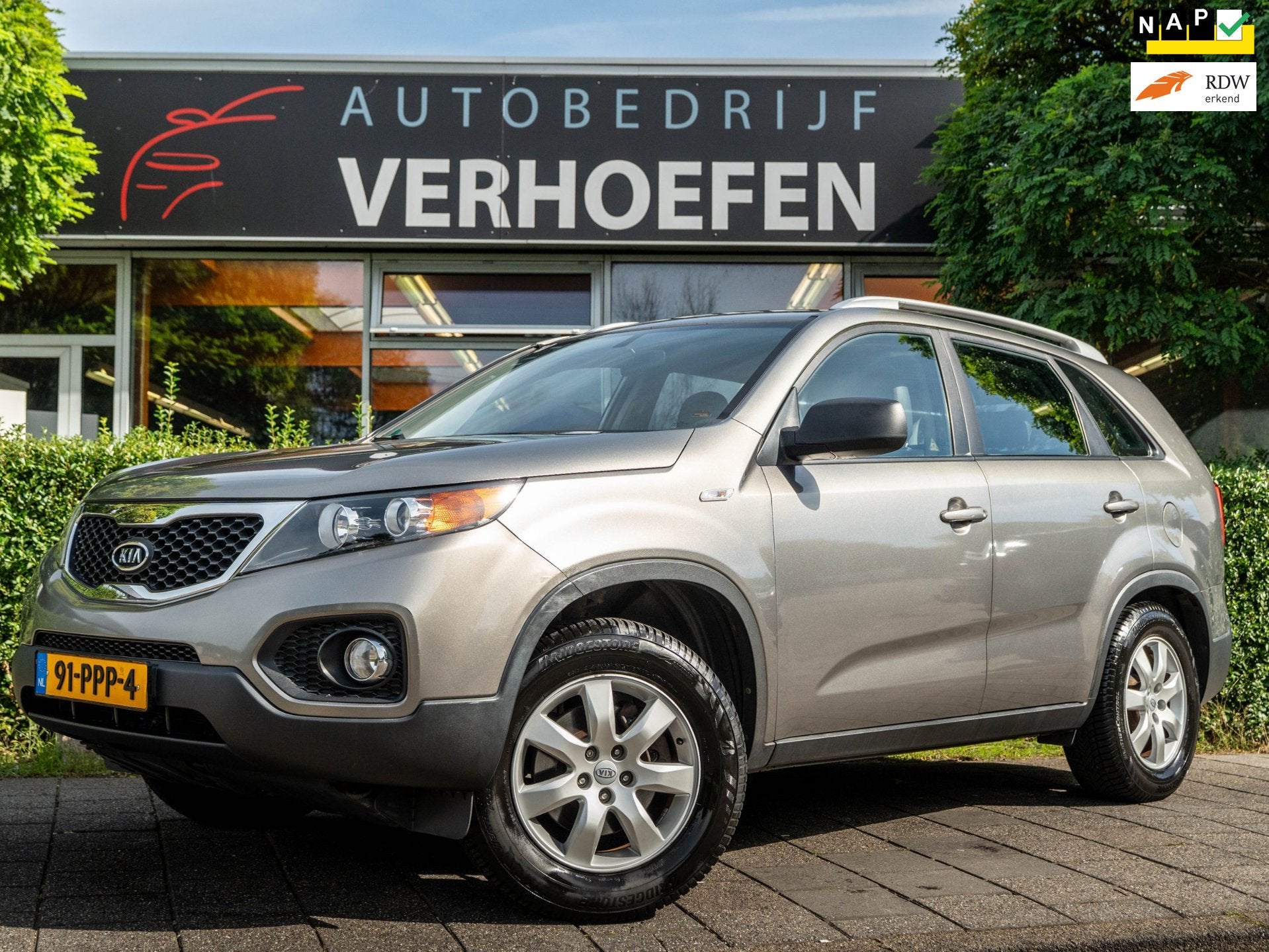 Kia Sorento 2.4 X-tra | NAVIGATIE | TREKHAAK | AIRCO | XENON, Auto's, Voorwielaandrijving, Zwart, 4 cilinders, 2000 kg