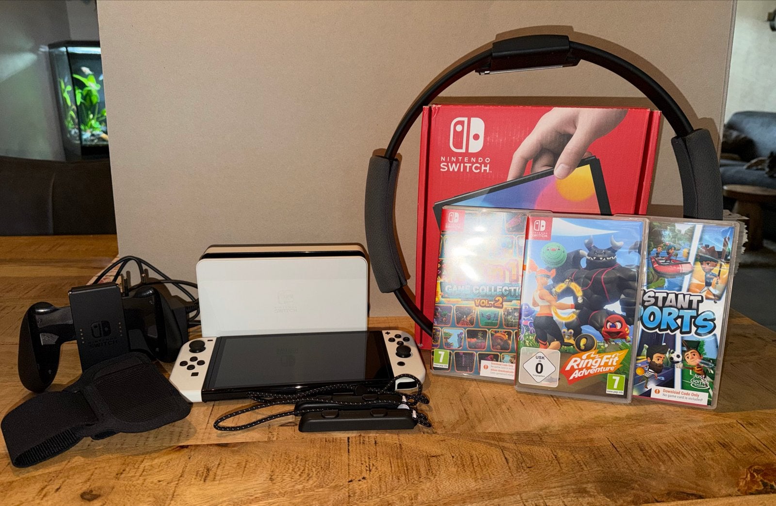 Nintendo Switch OLED met Ring Fit Adventure en games, Met games, Met 2 controllers, Zo goed als nieuw, Switch OLED