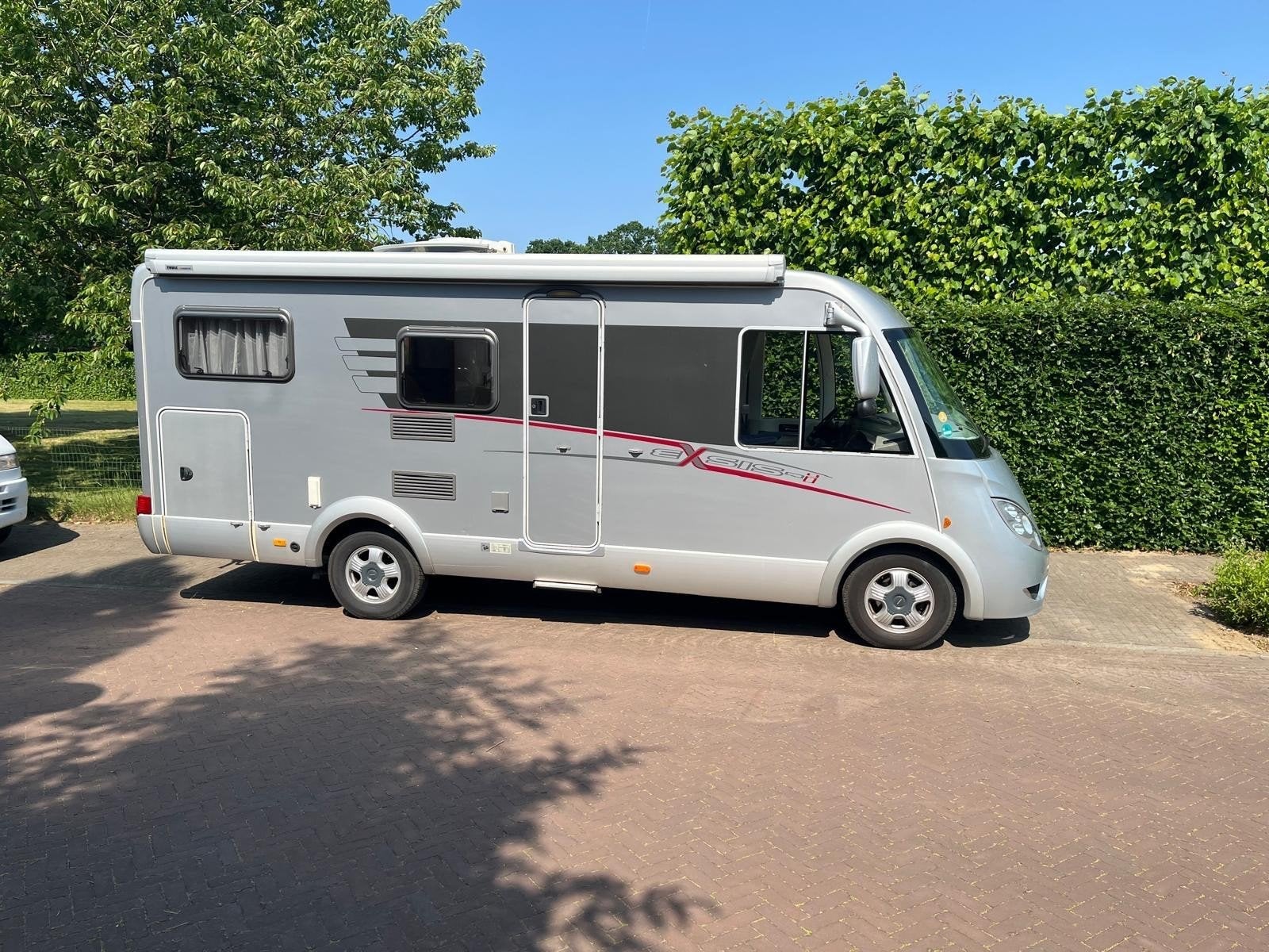 Hymer Exsis-i 572 (2009) met nieuwe motor en veel extra's, Integraal, Ringverwarming, Ford, 6 tot 7 meter