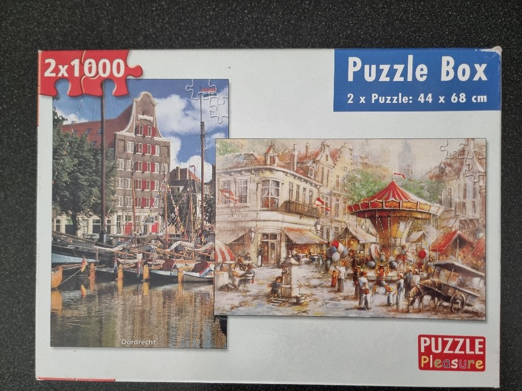 Legpuzzel 2 x 1000 stukjes.Onderwerp Dordrecht en draaimolen, Ophalen of Verzenden, 500 t/m 1500 stukjes, Zo goed als nieuw, Legpuzzel