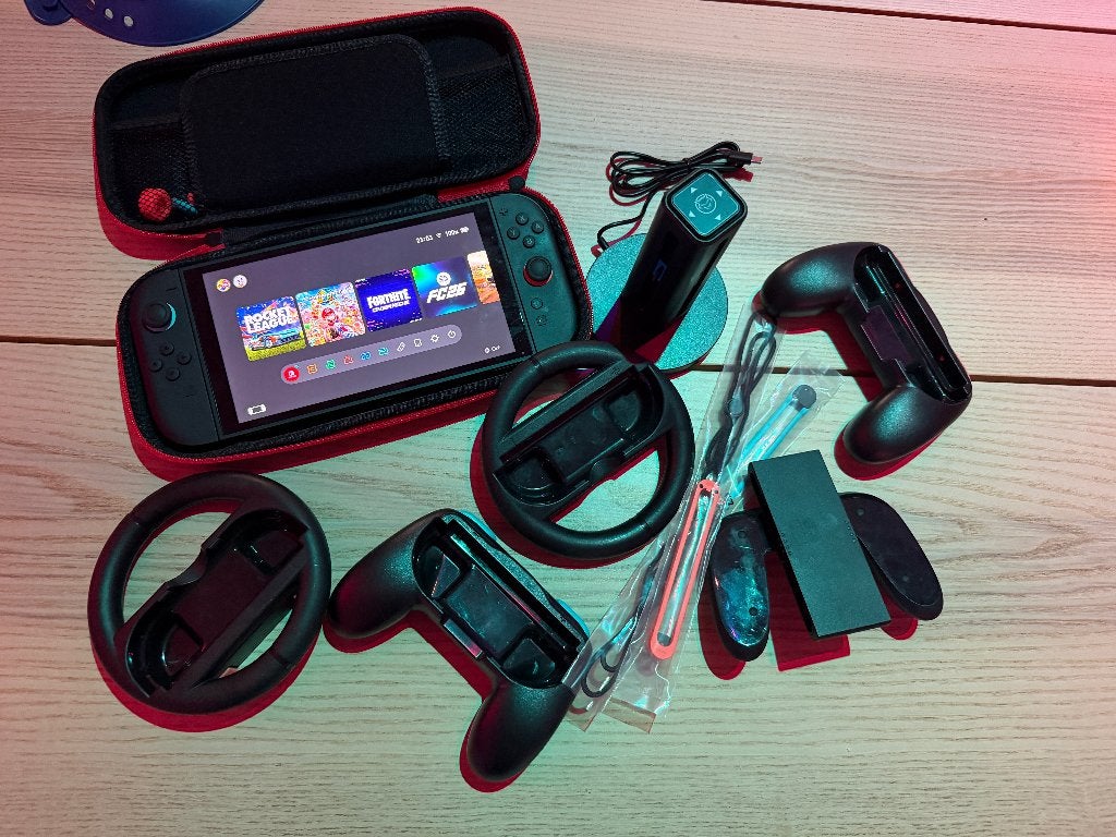 Nintendo Switch 2 Zwart + QWARE Nintendo Switch 2 Starter, Ophalen of Verzenden, Zo goed als nieuw, Met 2 controllers, Switch Original