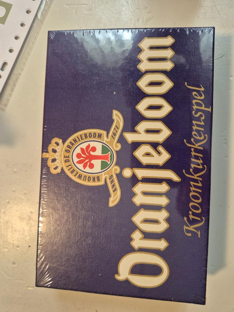 Oranjeboom Kroonkurkenspel - Nieuw in verpakking, Een of twee spelers, Ophalen of Verzenden, Nieuw, Brouwerij De Oranjeboom