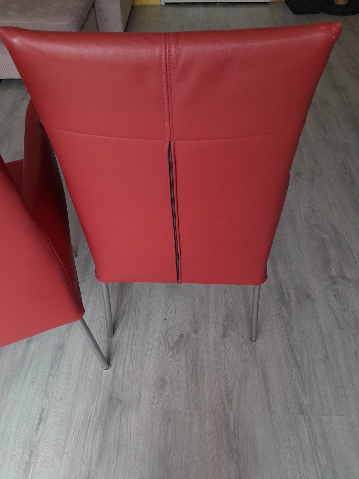 2 rode leren stoelen, Ophalen
