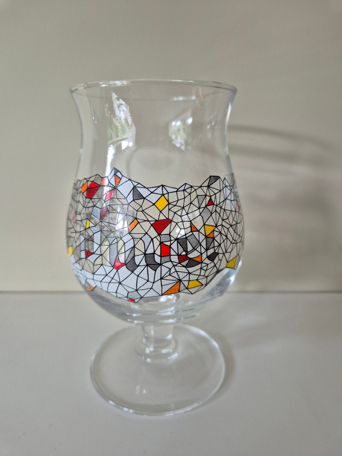 Duvel bierglas van Philippe Debongnie, 2014, Ophalen of Verzenden, Zo goed als nieuw, Glas of Glazen, Duvel