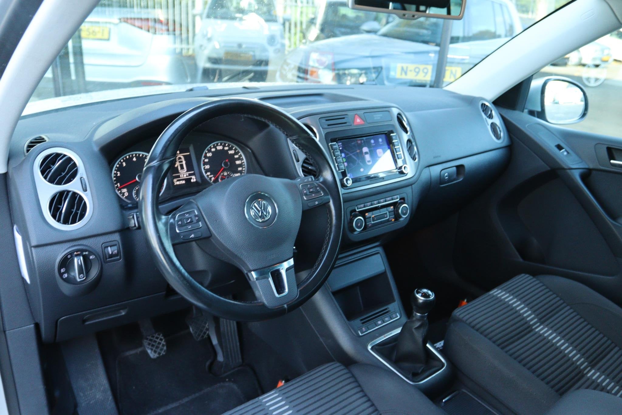 VOLKSWAGEN TIGUAN 2.0 TSI SPORT&STYLE 4MOTION | XENON | TREK, Auto's, Euro 5, Stof, Gebruikt, Zwart