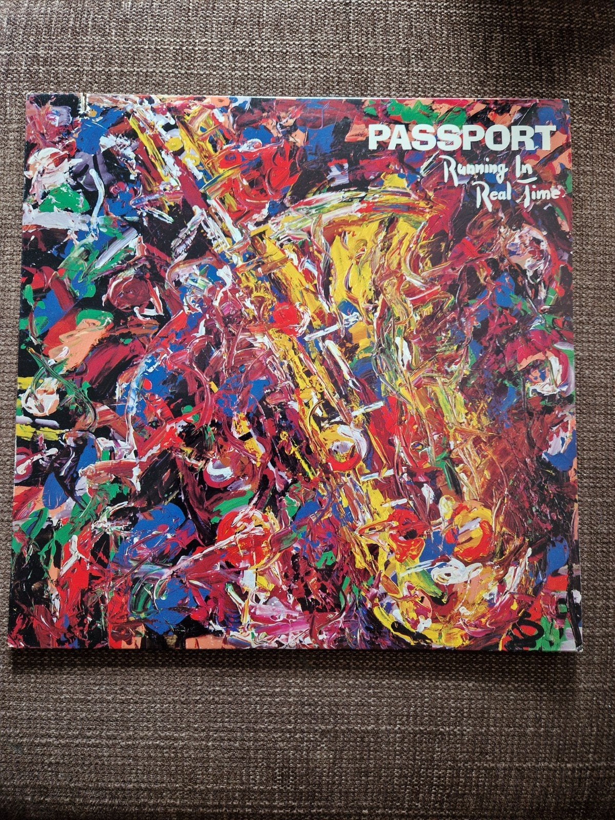 Passport - Running In Real Time LP (Jazz/Blues), Ophalen of Verzenden, 1980 tot heden, Zo goed als nieuw, Jazz en Blues