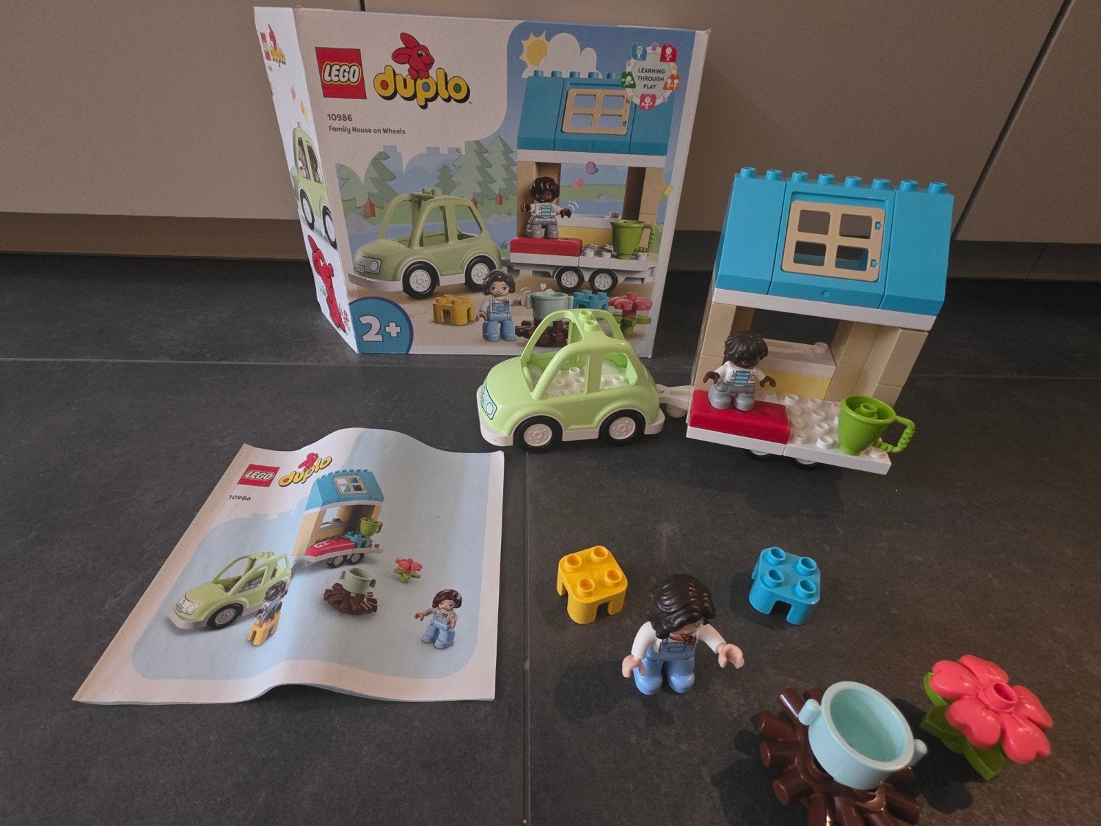 Lego Duplo 10986 Familiehuis op Wielen - Zo goed als nieuw, Inclusief instructies, Ophalen of Verzenden, Zo goed als nieuw, Duplo