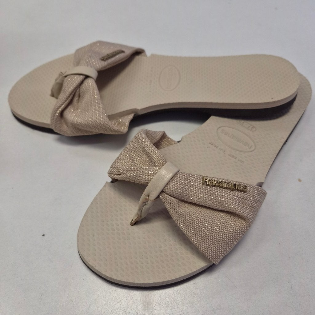 Havaianas slippers mt 38-39 beige/goud glitter strik 51937, Beige, Havaianas, Ophalen of Verzenden, Zo goed als nieuw