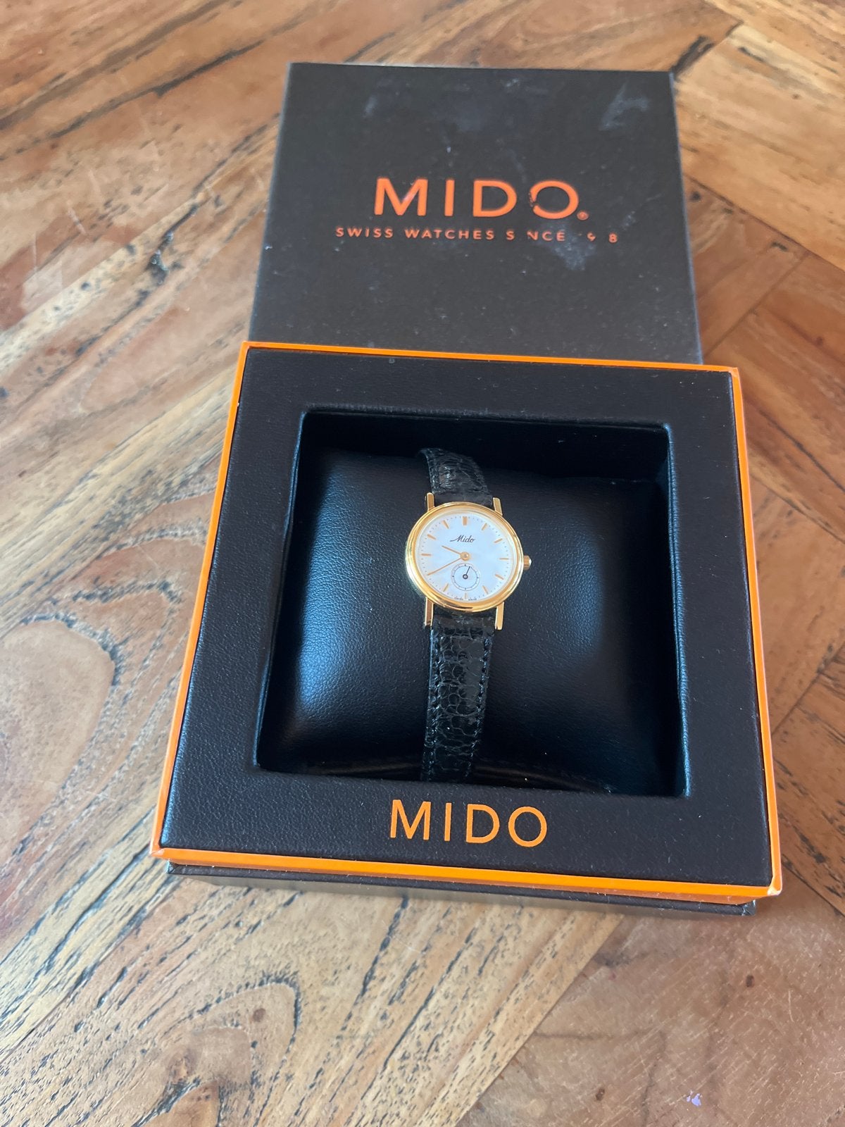 Mido Zwitsers horloge, goudmet leren bandje, Overige merken, Leer, Polshorloge, Ophalen of Verzenden