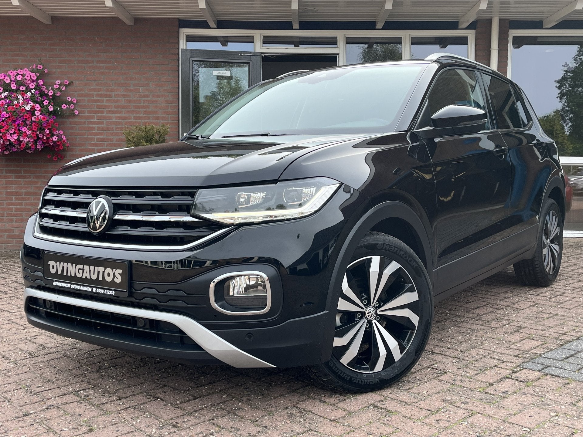 Volkswagen T-Cross 1.0 TSI Style (bj 2022, automaat), Auto's, Gebruikt, Zwart, Bedrijf, 3 cilinders