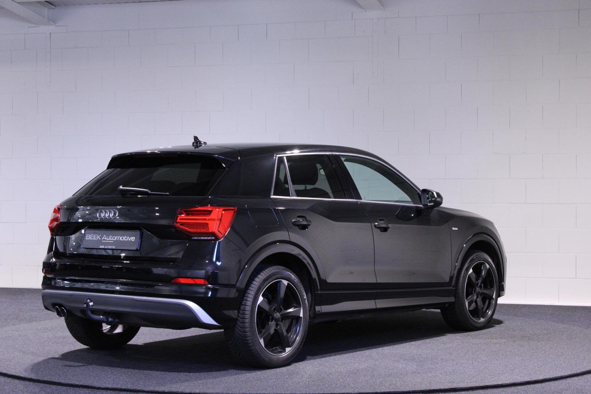 Audi Q2 1.4 TFSI CoD Sport Pro Line S | PDC | Trekhaak, Auto's, Gebruikt, 4 cilinders, Leder en Stof, Zwart