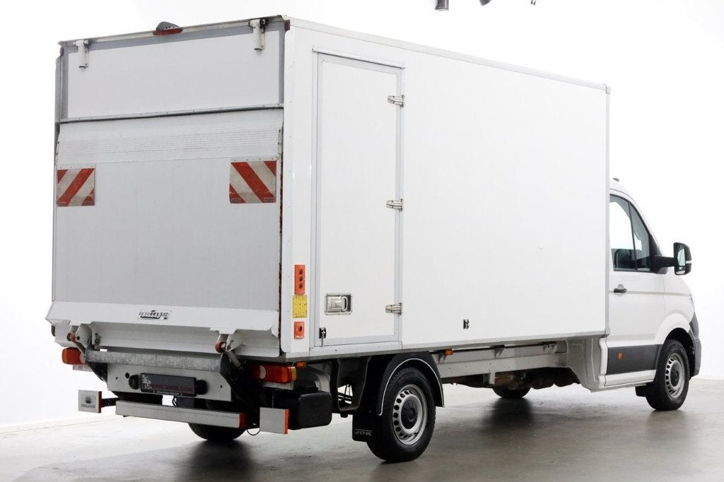 Volkswagen Crafter 35 2.0 TDI 140pk Bakwagen met laadklep en, Gebruikt, 4 cilinders, Wit, Bedrijf