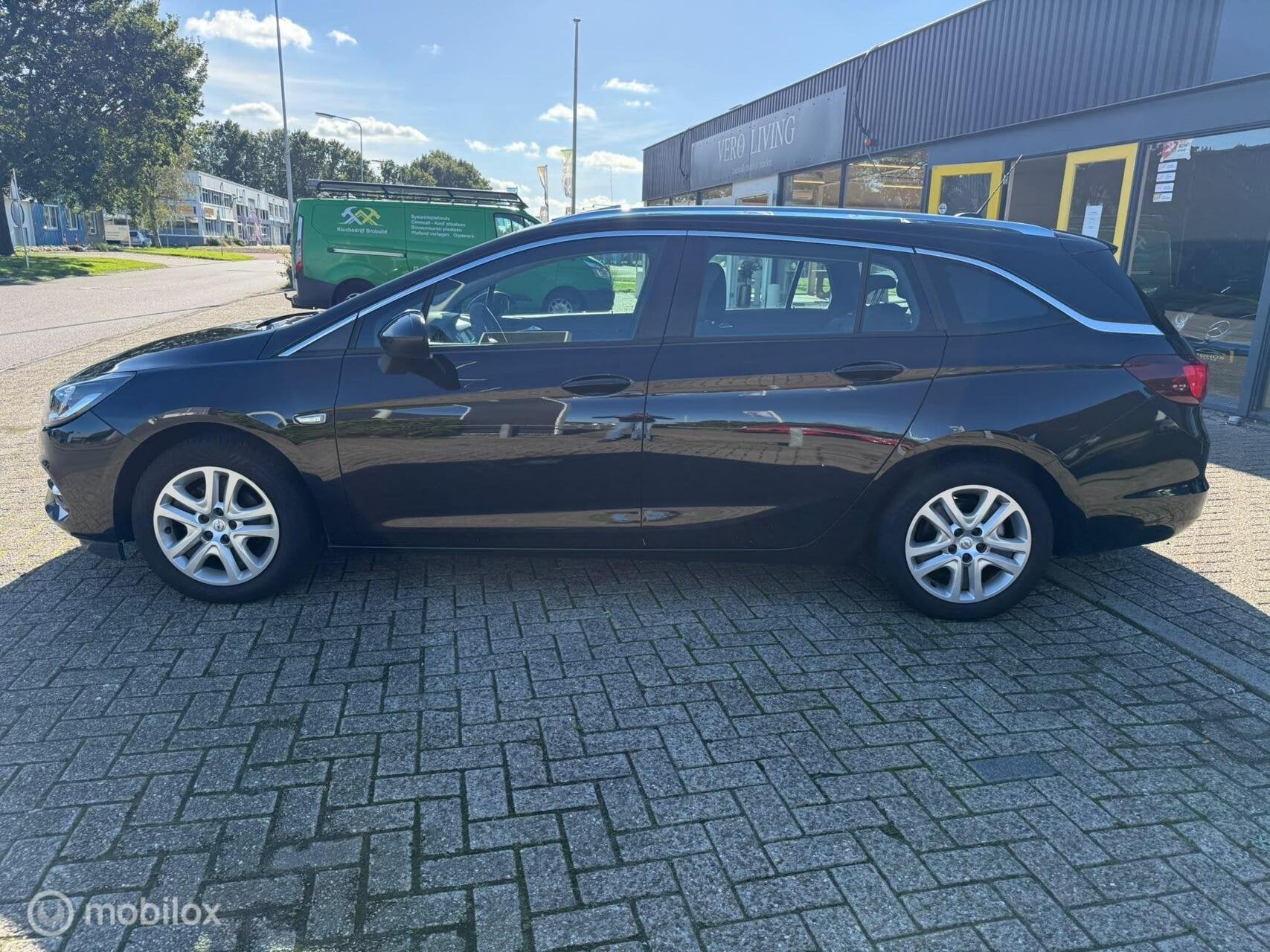 Opel Astra Sports Tourer 1.2 110 pk clima lm velgen cruise 1, Auto's, Voorwielaandrijving, Dealer onderhouden, Stof, Gebruikt