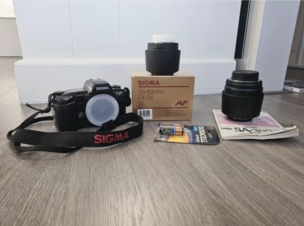 Sigma SA300 Spiegelreflexcamera met 2 lenzen en accessoires, Ophalen of Verzenden, Gebruikt, Spiegelreflex, Overige Merken