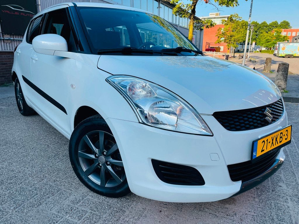 Suzuki Swift 1.2 5 DEURS AIRCO 15'LMV PARELMOER WIT SPORT, Voorwielaandrijving, Elektrische ramen, Gebruikt, 4 cilinders