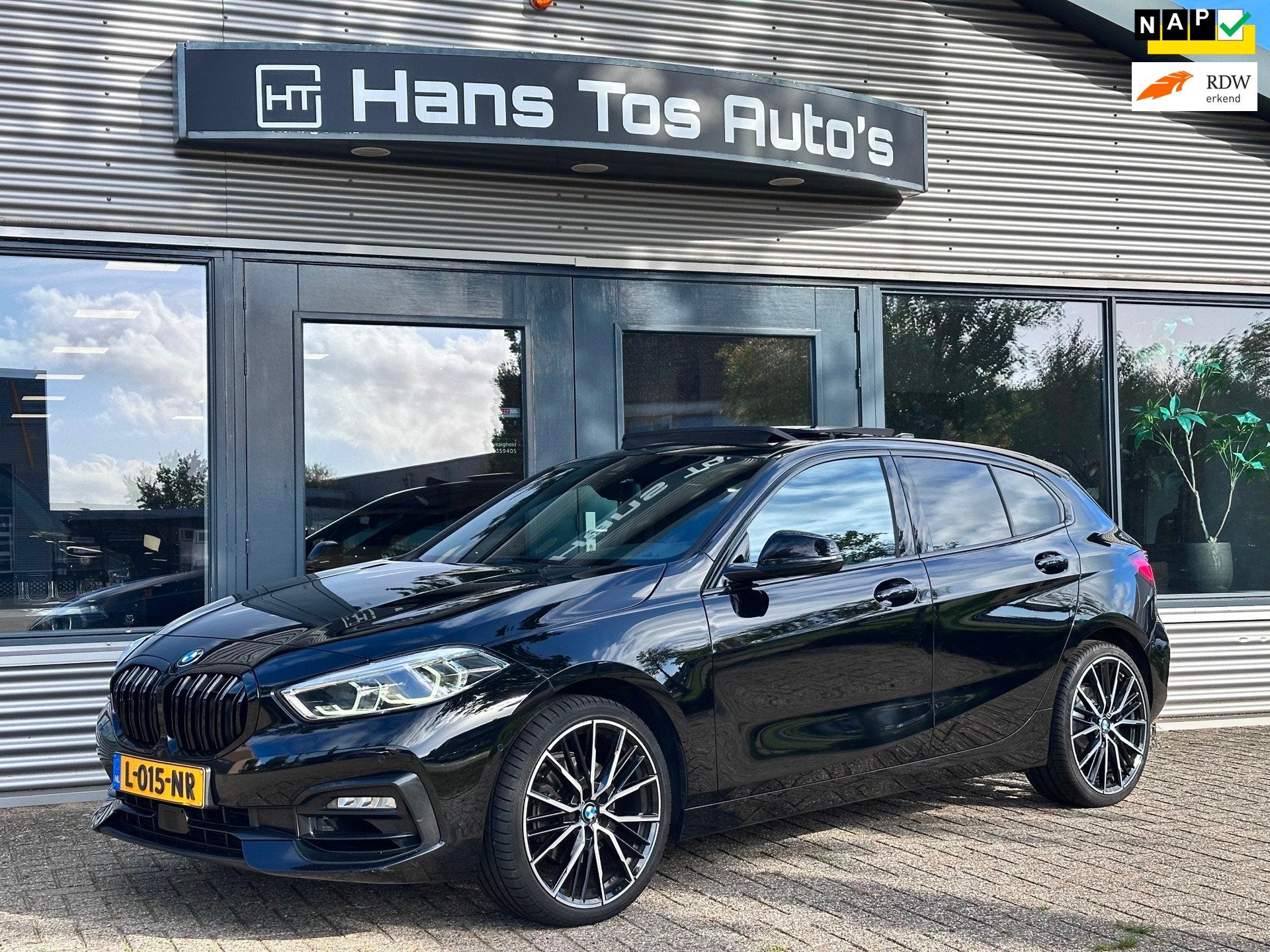 BMW 1-serie 116i AUT Executive Sport Edition/Panorama /Leer, Dealer onderhouden, Gebruikt, Leder en Stof, Zwart