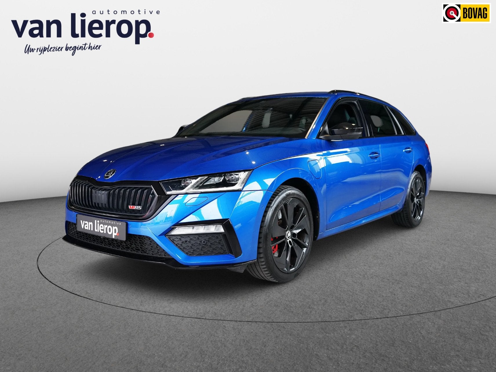 Skoda Octavia Combi 1.4 TSI RS iV PHEV ELEKTR. STOELEN | ACC, Auto's, Dealer onderhouden, Zwart, 4 cilinders, Blauw