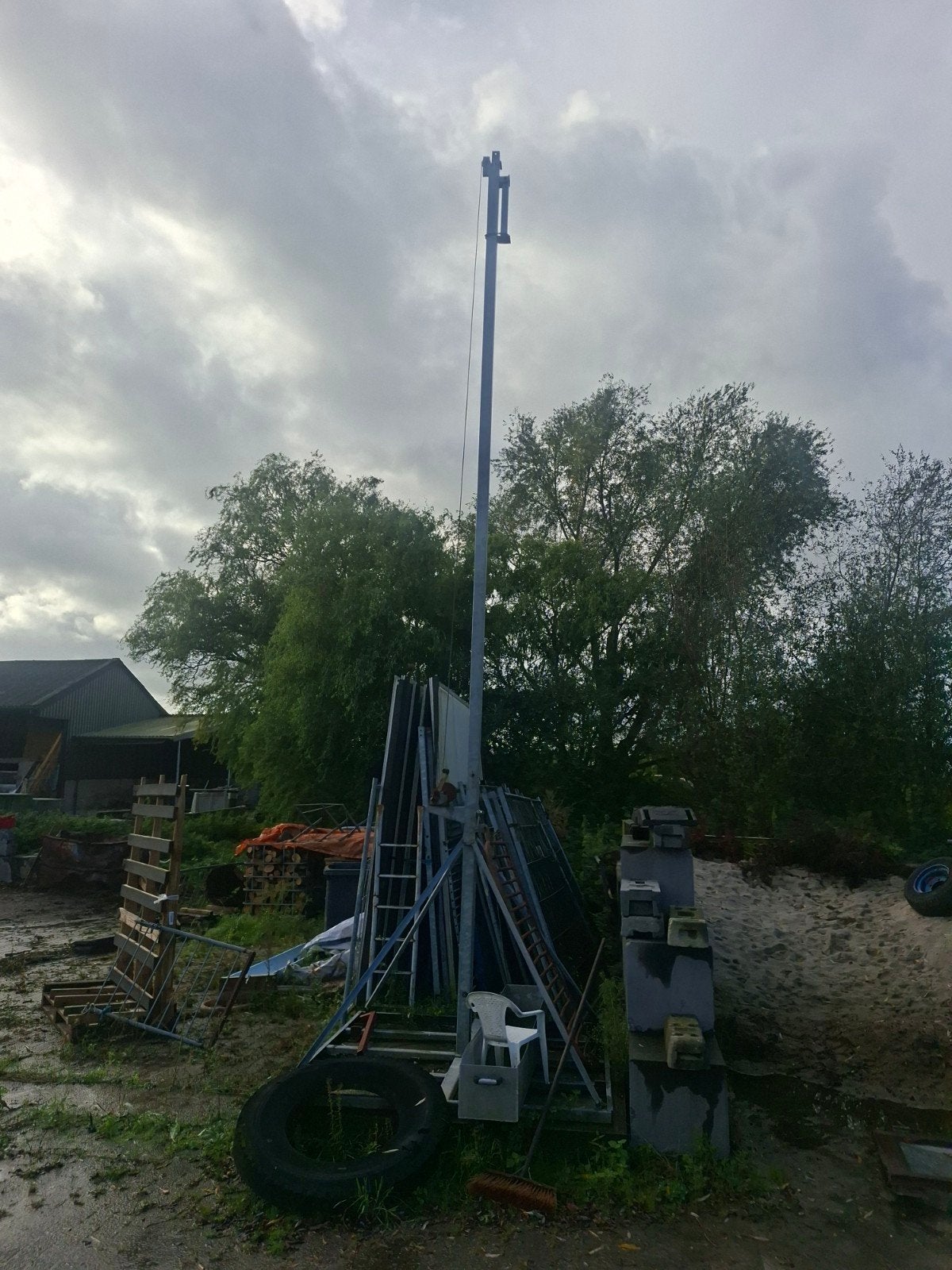 Lichtmast 6/12m op steltonplaat met 2 lampen, Ophalen