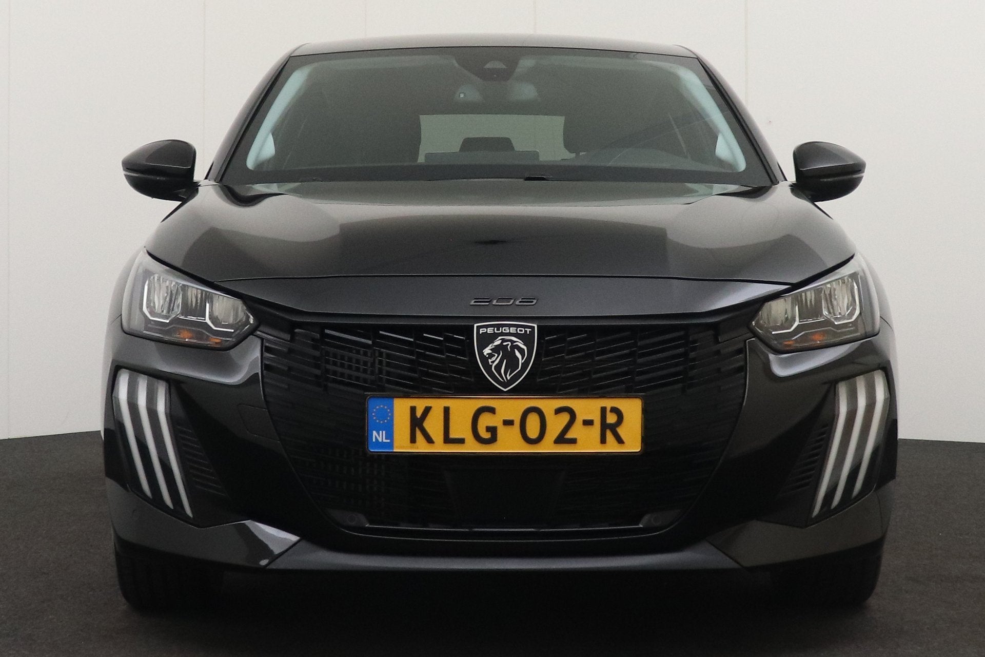 Peugeot 208 1.2T 101 PK Allure Half-Leder Carplay Privacy Gl, Auto's, Voorwielaandrijving, 101 pk, Gebruikt, Leder en Stof
