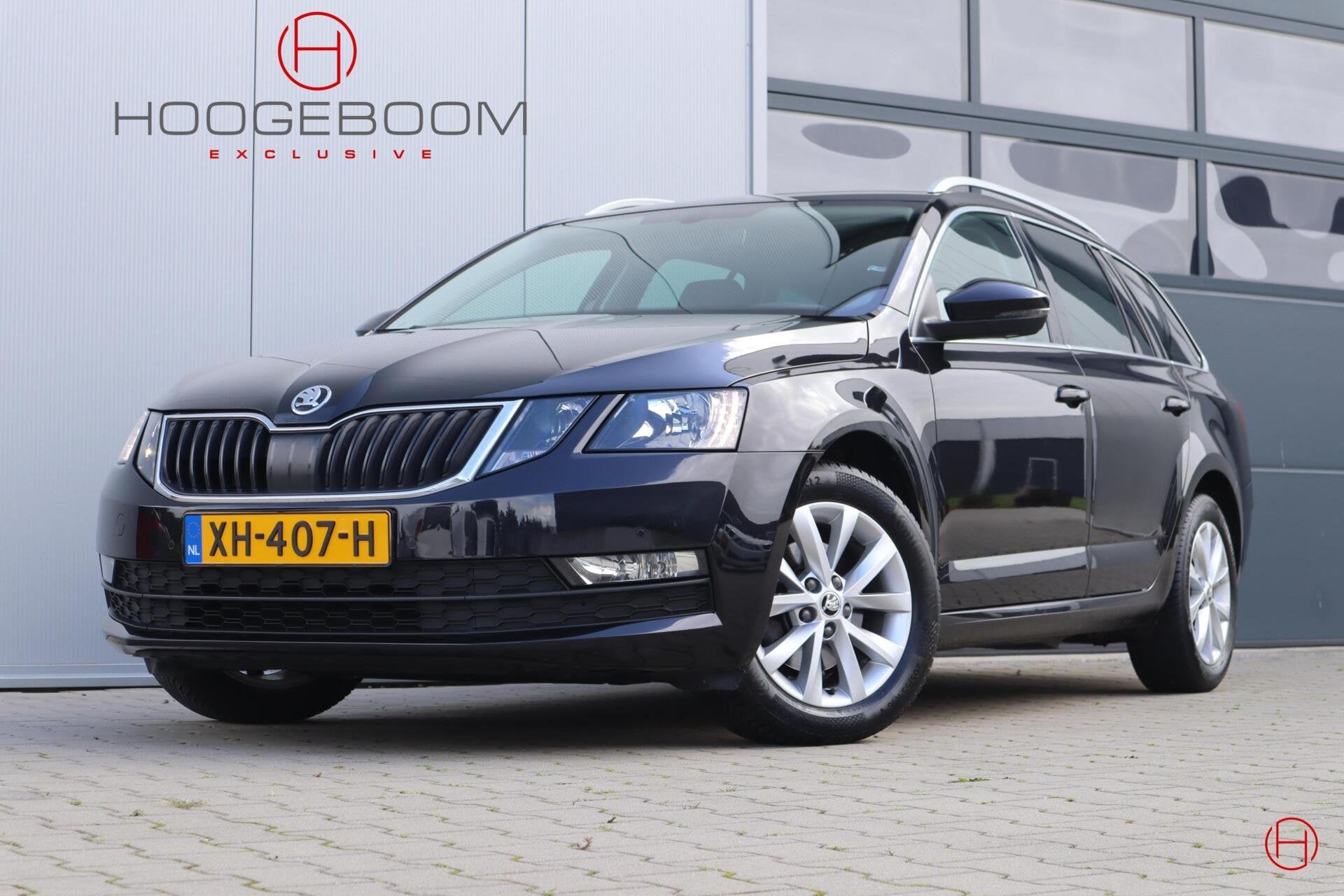 Skoda Octavia Combi 1.0 TSI / Clima / Cruise / PDC / Stoelve, Auto's, Stof, Gebruikt, Zwart, Handgeschakeld