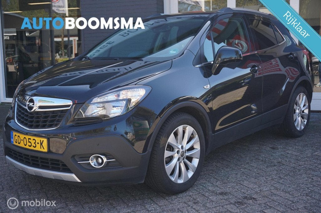 Opel Mokka 1.4 T 140pk Cosmo Clima Cruise Navi Trekhaak, Voorwielaandrijving, Gebruikt, 4 cilinders, Leder en Stof