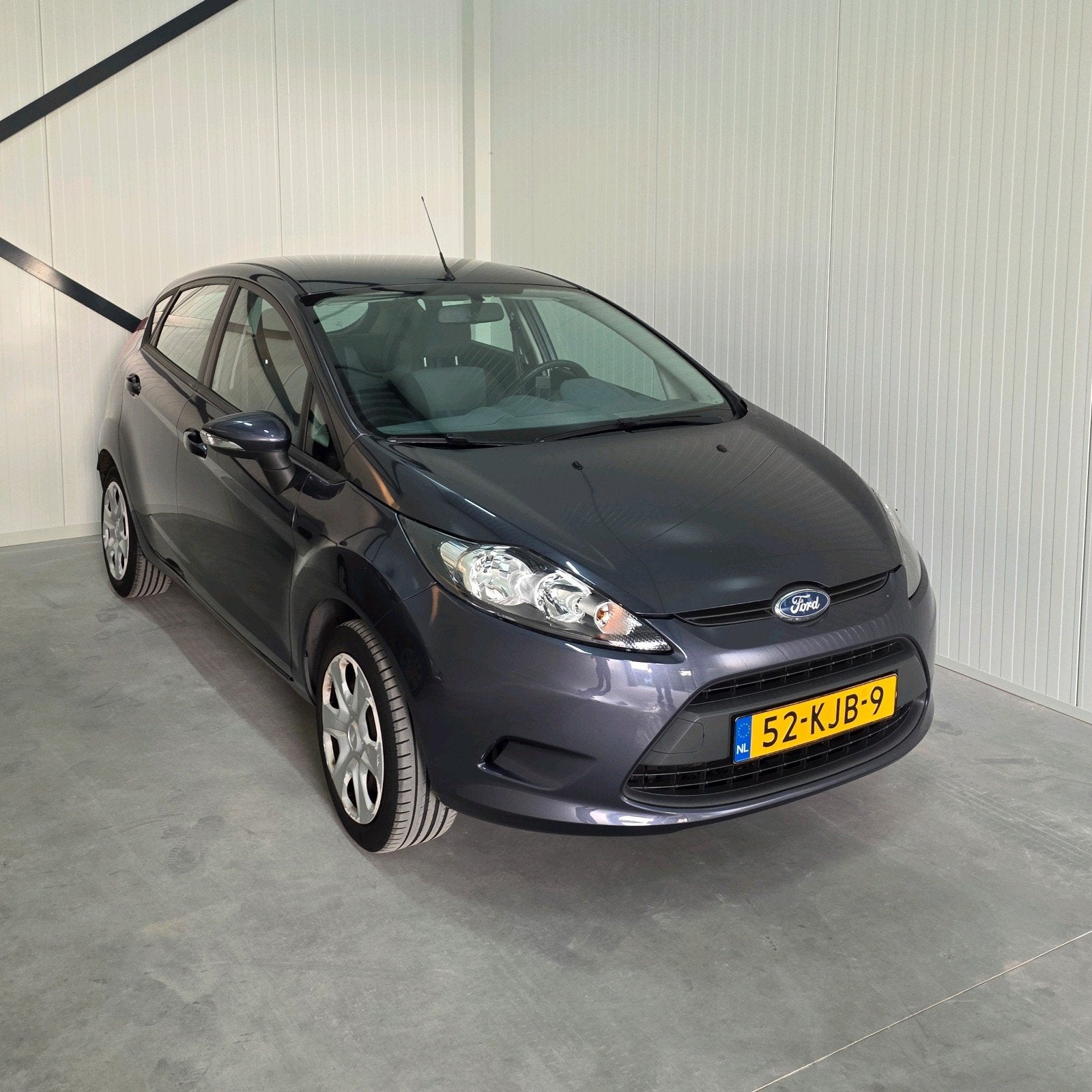 Ford Fiësta 1.25 NAP 44KW 5DR 2009 Grijs, Auto's, Ford, Voorwielaandrijving, Stof, 40 €/maand, 4 cilinders