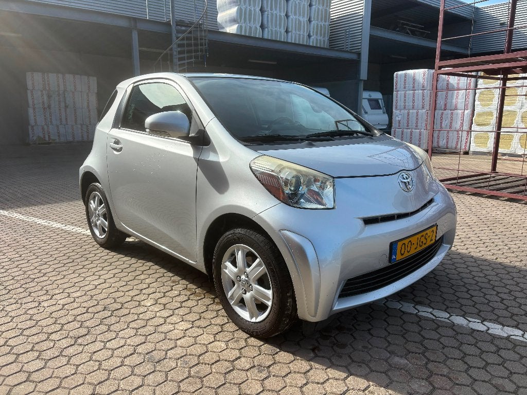 Toyota IQ 1.0 2009 Grijs, Auto's, Euro 5, Stof, Zwart, 4 stoelen