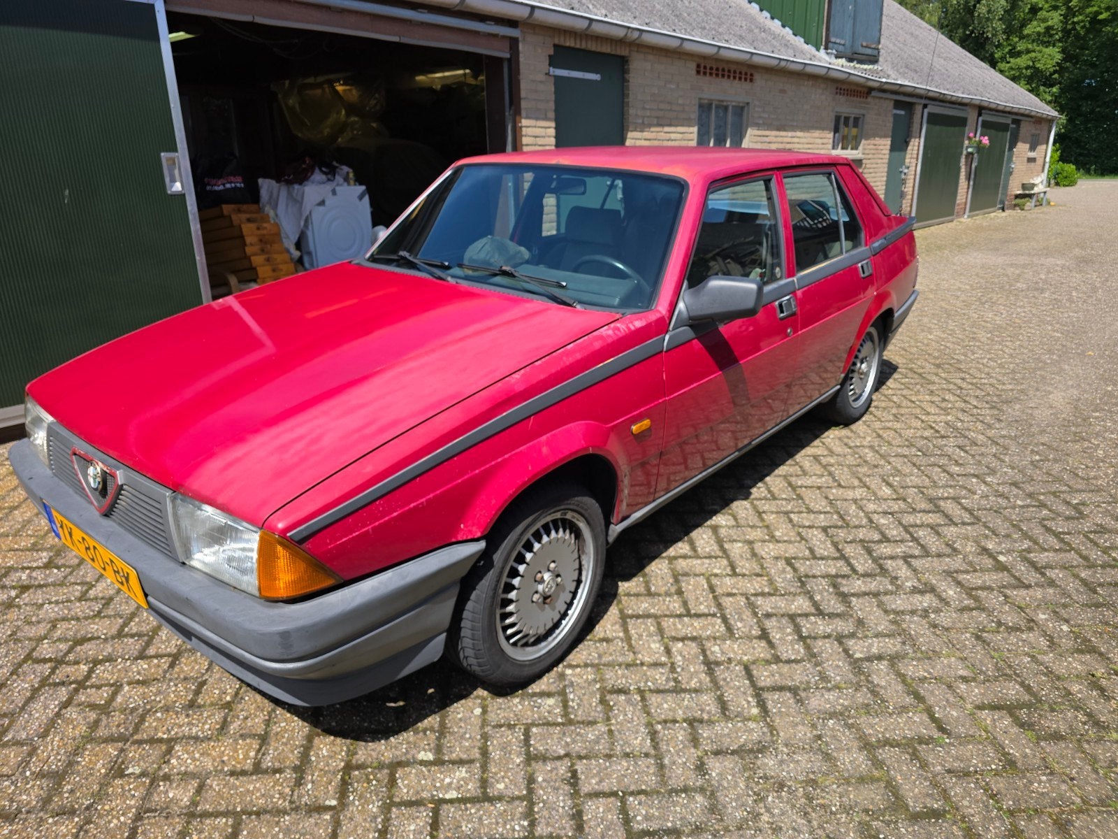 Alfa Romeo 75 1.8 IE KAT U9 1990 Rood, Auto's, Alfa Romeo, Achterwielaandrijving, 118 pk, 4 cilinders, Origineel Nederlands