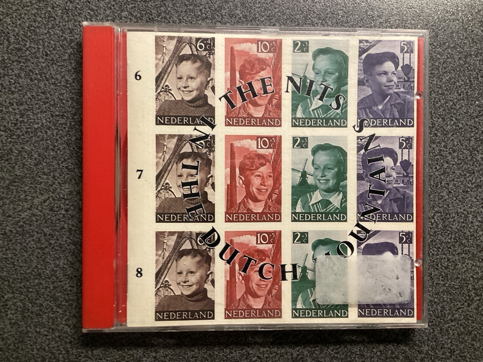 The Nits - In The Dutch Mountains CD (Pop, 1987), Pop, Ophalen of Verzenden, Zo goed als nieuw, Inclusief boekje