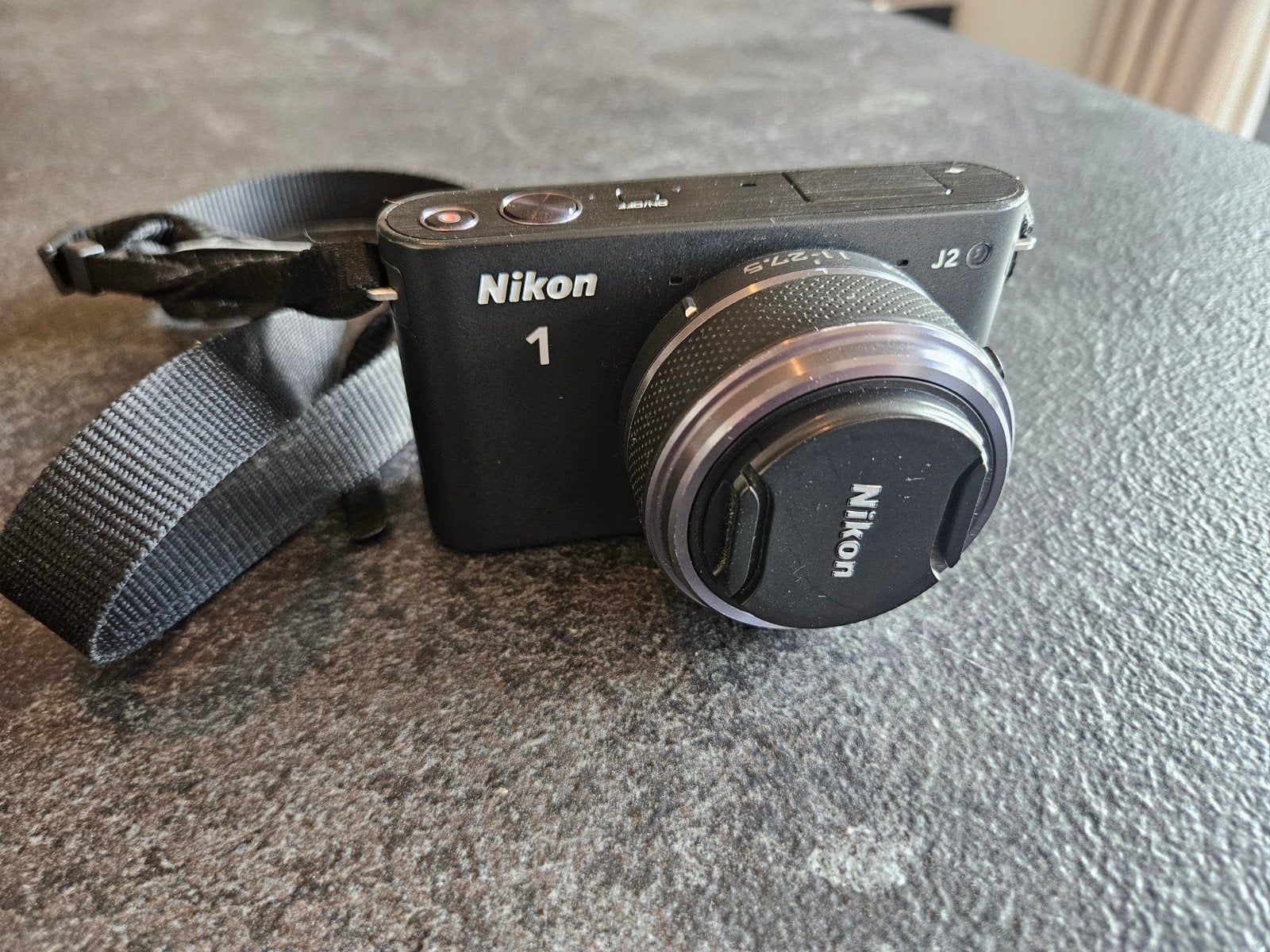 Nikon 1 J2 Systeemcamera, Draagriem, Ophalen of Verzenden, Zo goed als nieuw, Nikon