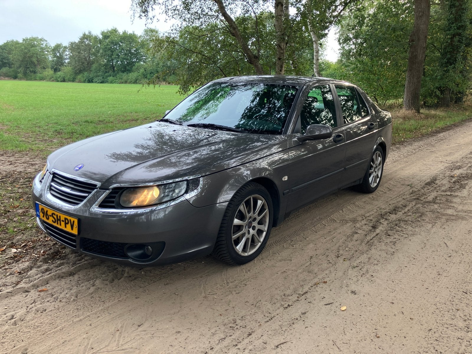 Saab 9-5 2.0 T Sport Sedan AUT 2006 Grijs, Auto's, Saab, Stof, 1800 kg, 4 cilinders, 1505 kg