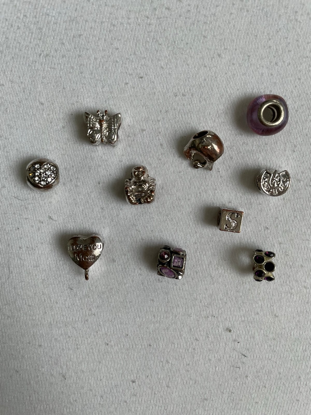 Diverse bedels voor armbanden - Zilverkleur, Overige merken, Gebruikt, Ophalen of Verzenden, 4 bedels of meer
