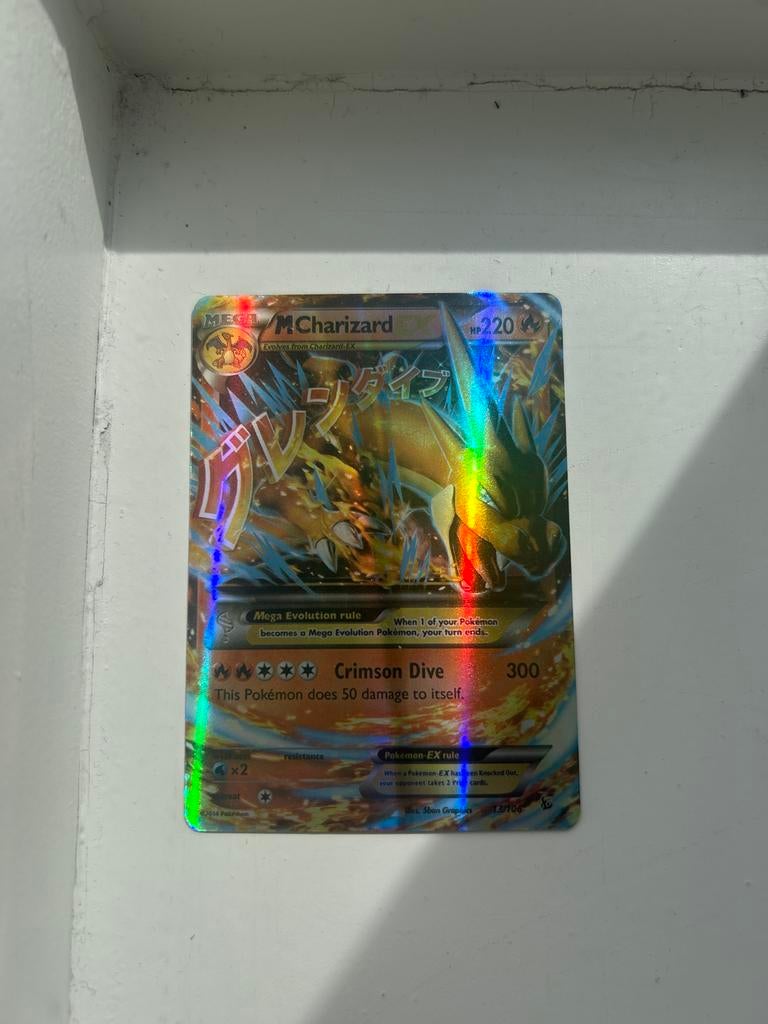 M Charizard EX Pokémon Kaart - Holo Foil, Ophalen of Verzenden, Zo goed als nieuw, Losse kaart, Foil