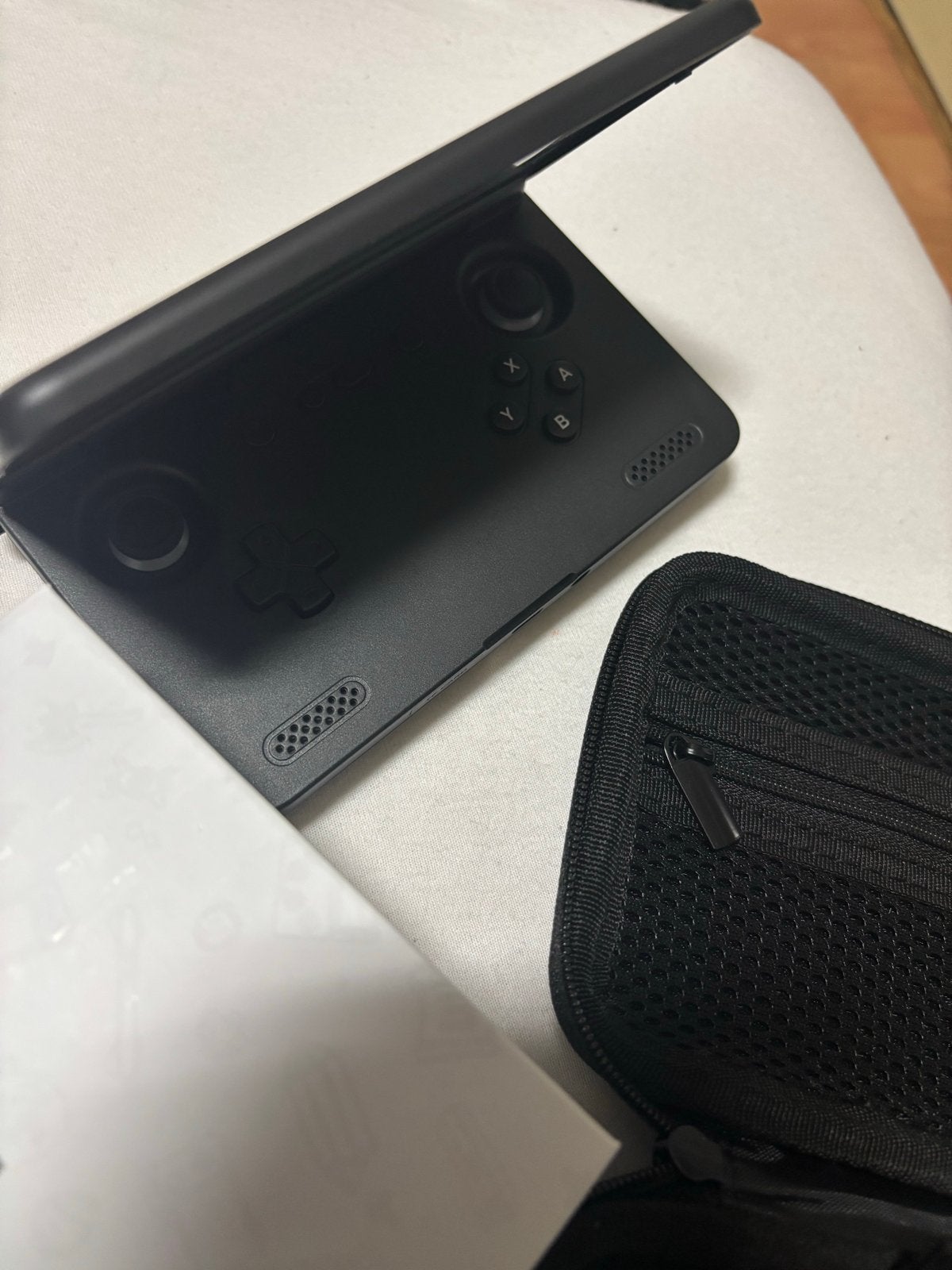 Retroid Pocket Flip 2 handheld console met hoesje, Ophalen of Verzenden, Retroid, Zo goed als nieuw